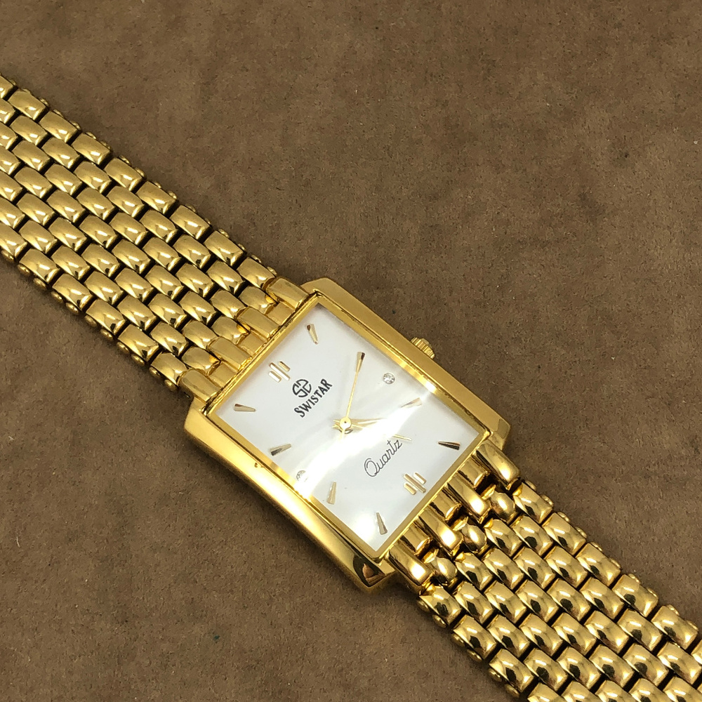 Fabulous Swistar Gold Tone Metal Link Tank Watch